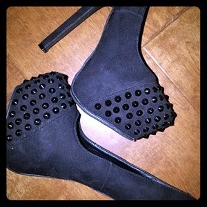 Black suede studded pumps
